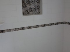 Custom tile work in the main bathroom