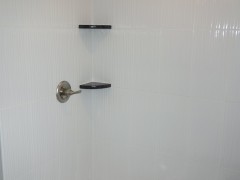 Additional ceramic tile details of walk-in master shower