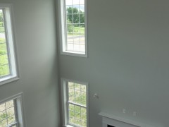 View of double height family room from second floor balcony